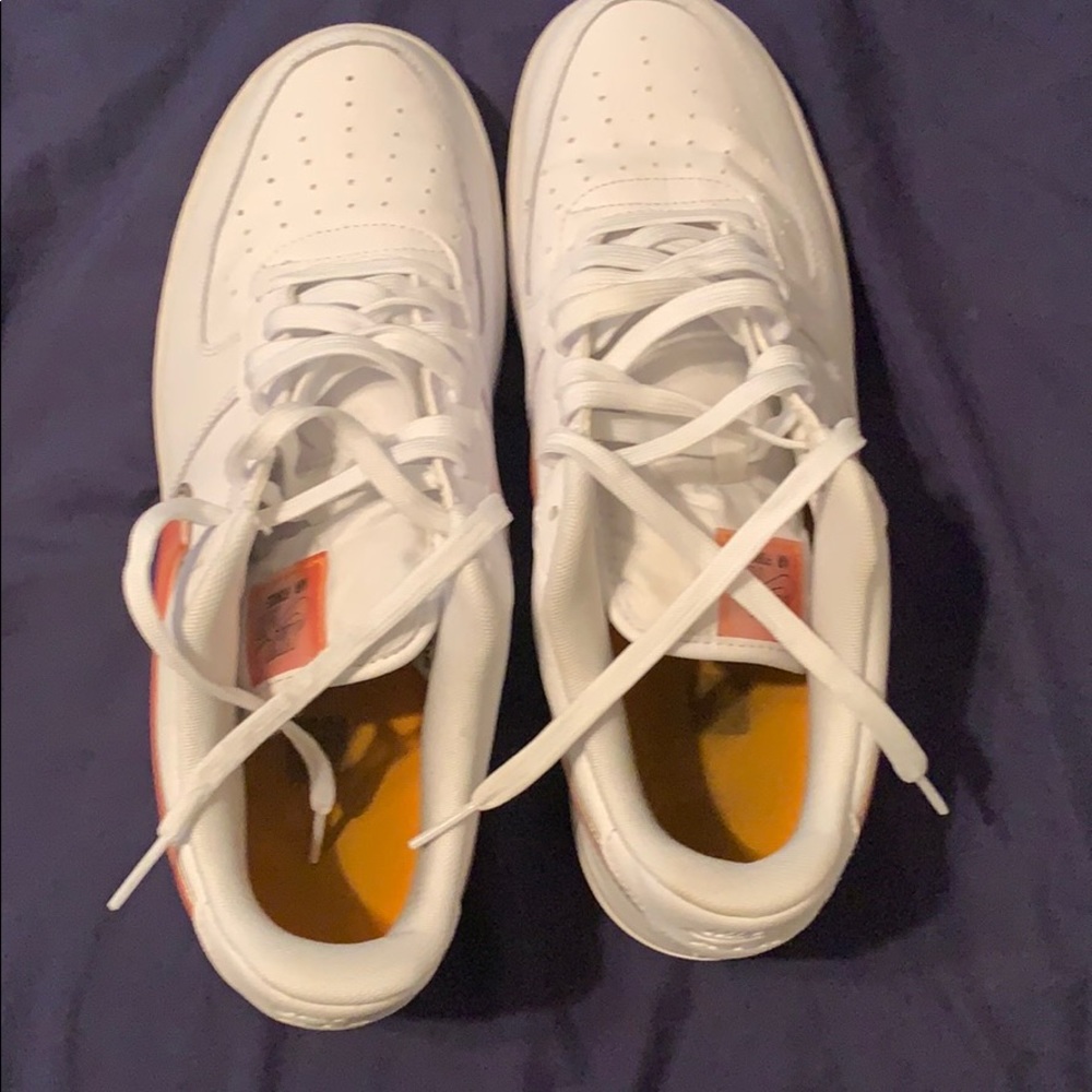 These are White and Orange Air Force Ones.
